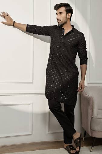 black chikankari kurta and white palazzo set