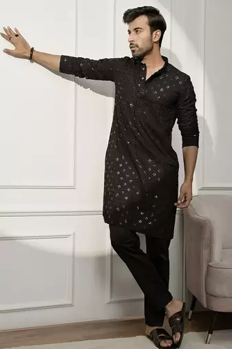 black chikankari kurta and white palazzo set