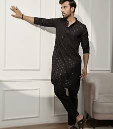 black chikankari kurta and white palazzo set