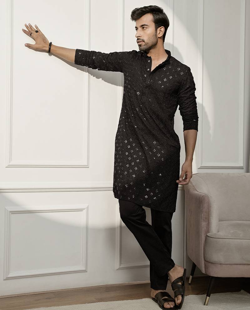 black chikankari kurta and white palazzo set