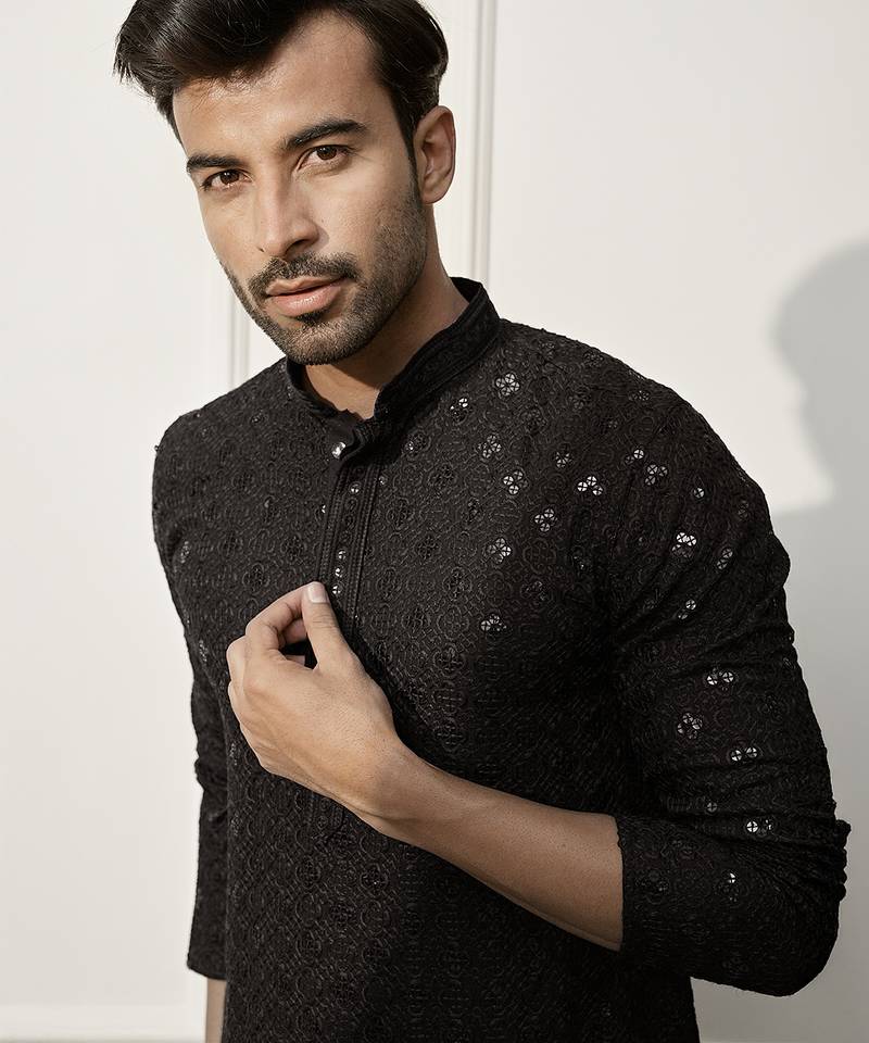 black chikankari kurta and white palazzo set