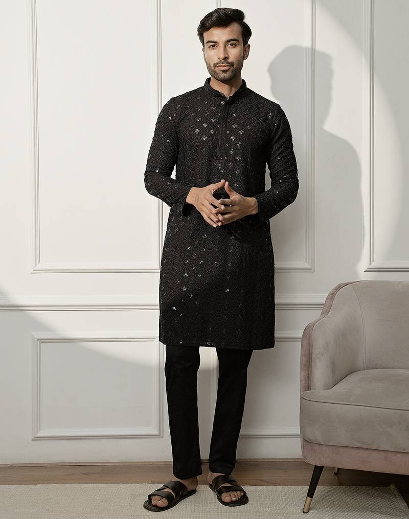 black chikankari kurta and white palazzo set