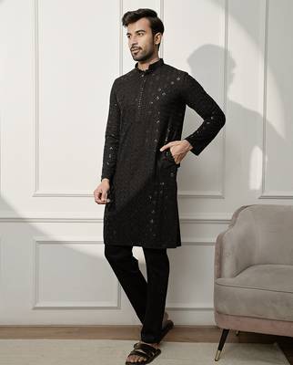 black chikankari kurta and white palazzo set 4