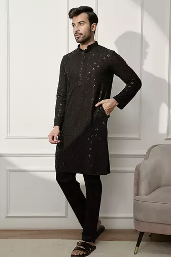 black chikankari kurta and white palazzo set