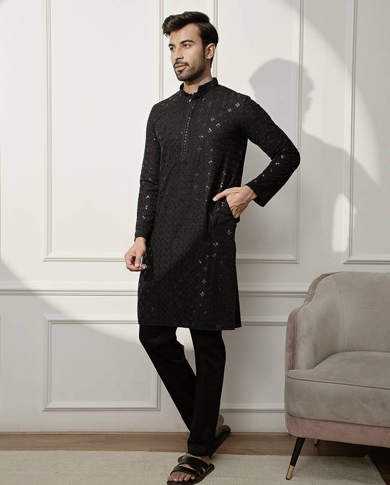black chikankari kurta and white palazzo set