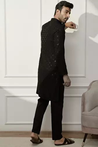 black chikankari kurta and white palazzo set