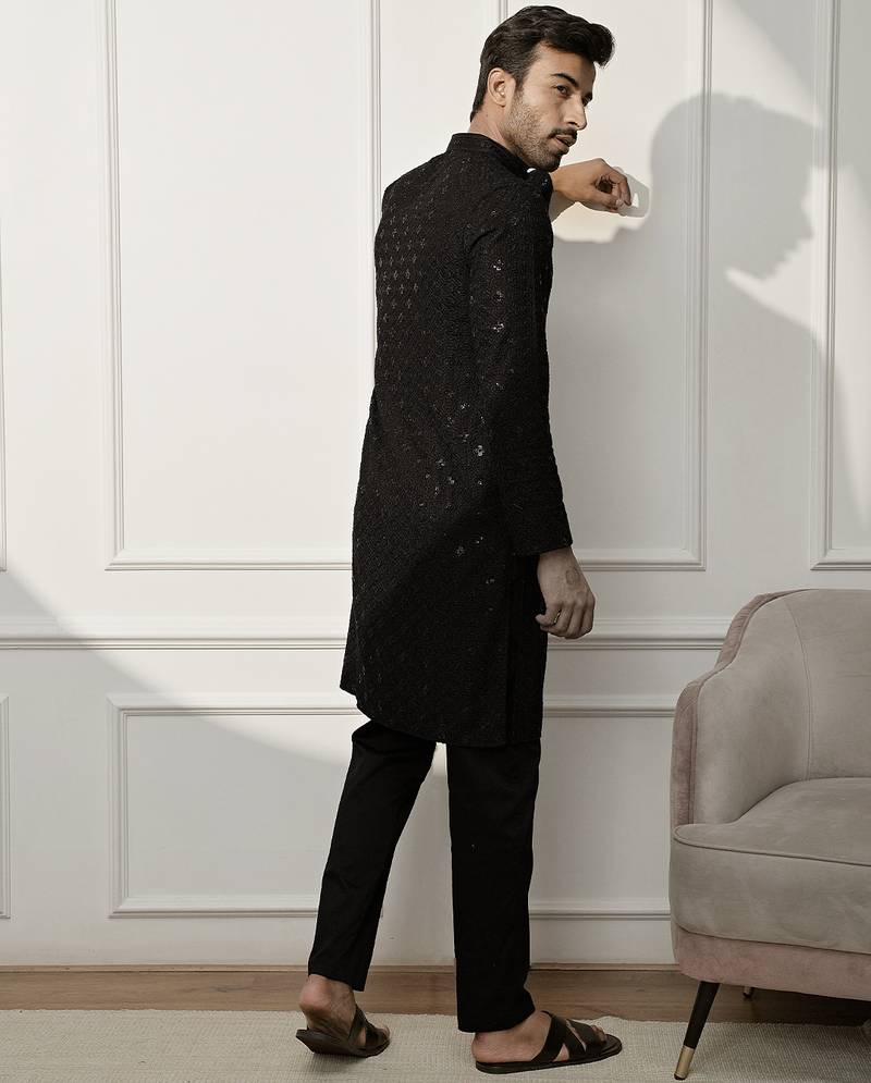 black chikankari kurta and white palazzo set