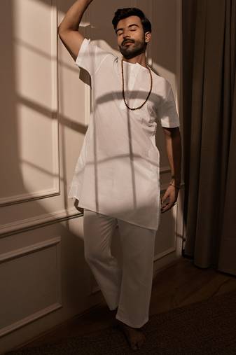 white cotton mid-length kurta and palazzo set