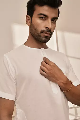 white cotton mid-length kurta and palazzo set
