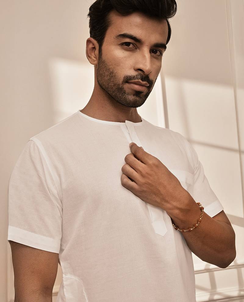 white cotton mid-length kurta and palazzo set