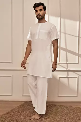 white cotton mid-length kurta and palazzo set