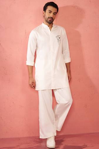 White fine satin stone work kurta with cream flare pant - festive set