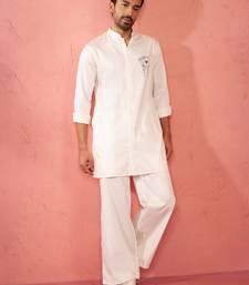 White fine satin stone work kurta with cream flare pant - festive set