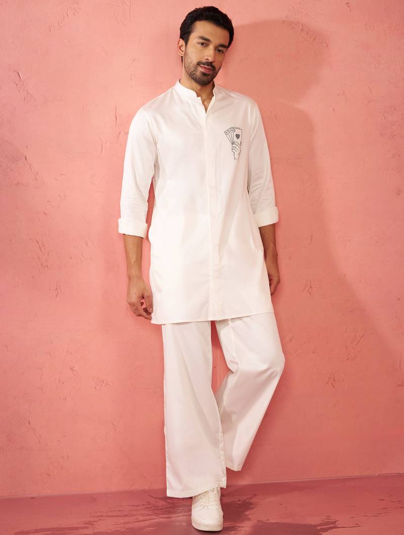 White fine satin stone work kurta with cream flare pant - festive set