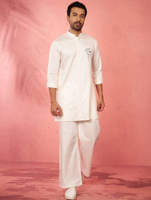 White fine satin stone work kurta with cream flare pant - festive set 3