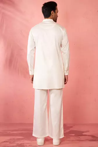 White fine satin stone work kurta with cream flare pant - festive set