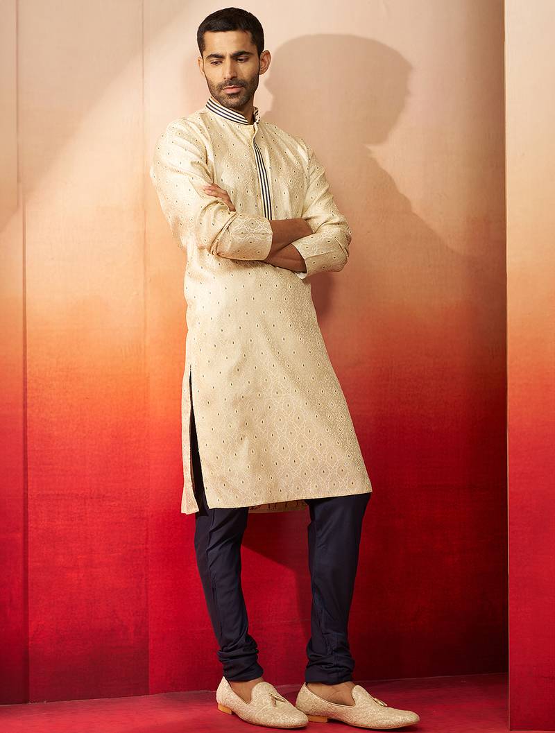 cream embroidered kurta with navy blue churidar - thread zari work set