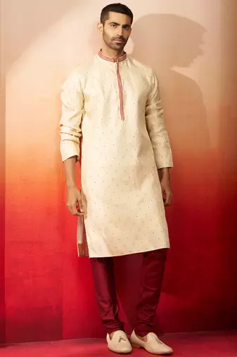cream embroidered kurta with maroon churidar - premium thread zari work