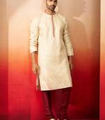 cream embroidered kurta with maroon churidar - premium thread zari work