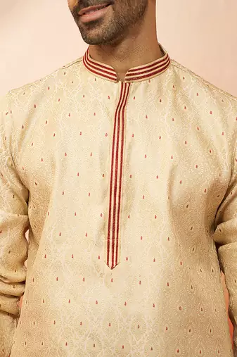 cream embroidered kurta with maroon churidar - premium thread zari work