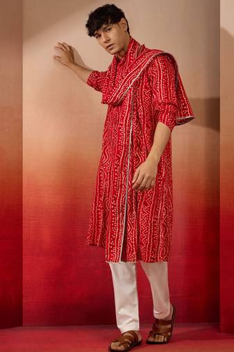 red bandhani kurta set with cream pant and dupatta - traditional ethnic set