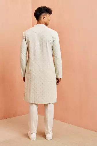 pista green chikankari kurta with cream pant - embroidered festive set