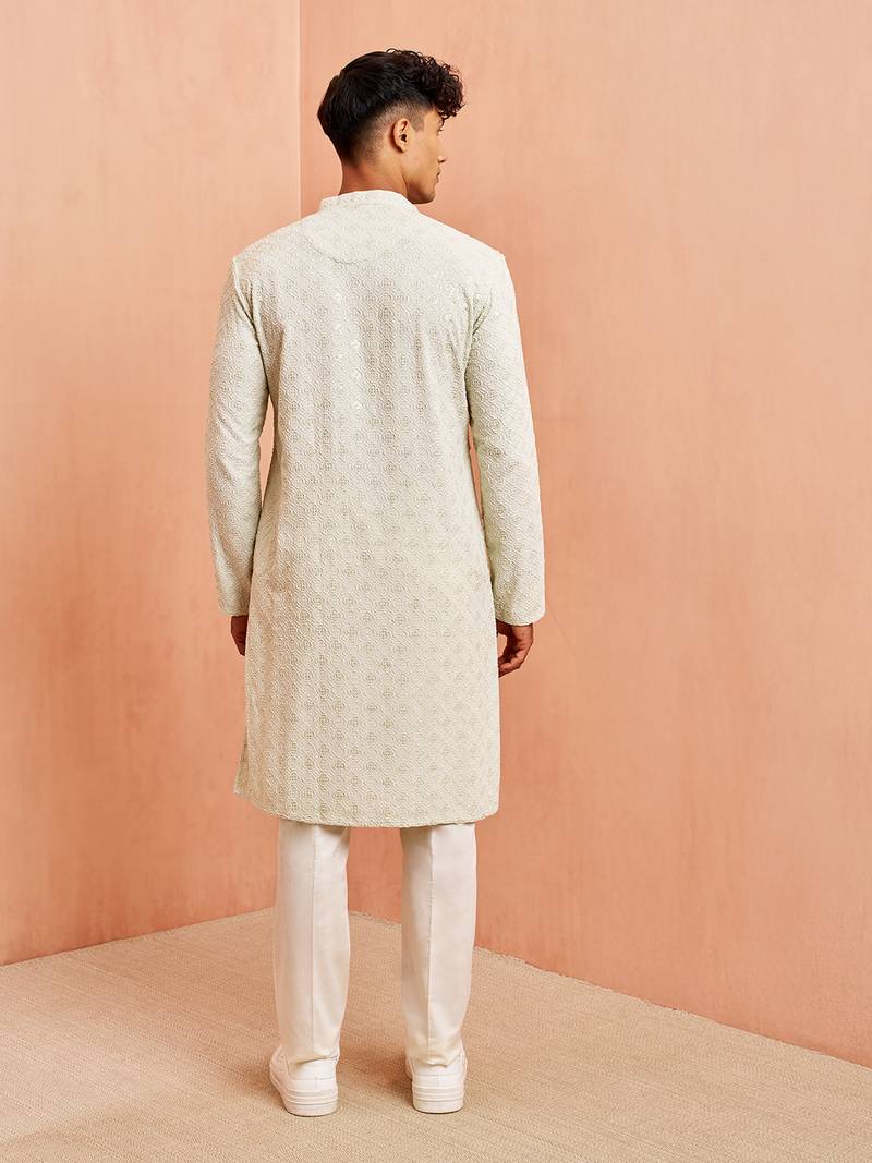 pista green chikankari kurta with cream pant - embroidered festive set