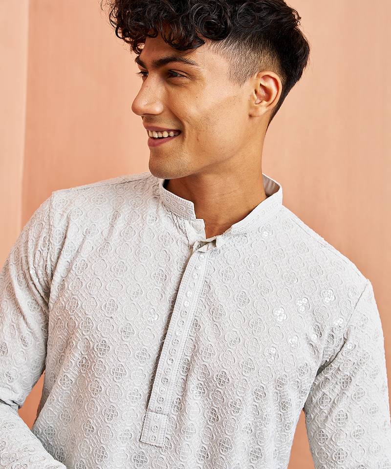 Blue chikankari kurta with cream pant - modern embroidered set