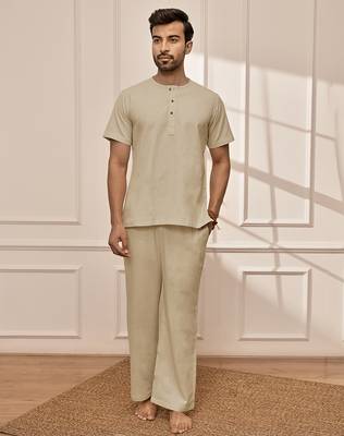 Premium beige cotton kurta palazzo set with back embroidery 3