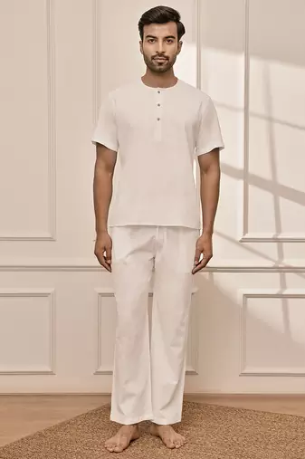Pure white cotton kurta palazzo set with back embroidery