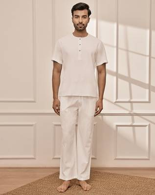Pure white cotton kurta palazzo set with back embroidery 3