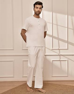 Pure white cotton kurta palazzo set with back embroidery 4