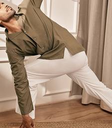 Mehendi green cotton short kurta and white palazzo set