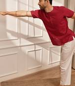 Red cotton kurta with om embroidery and white palazzo set