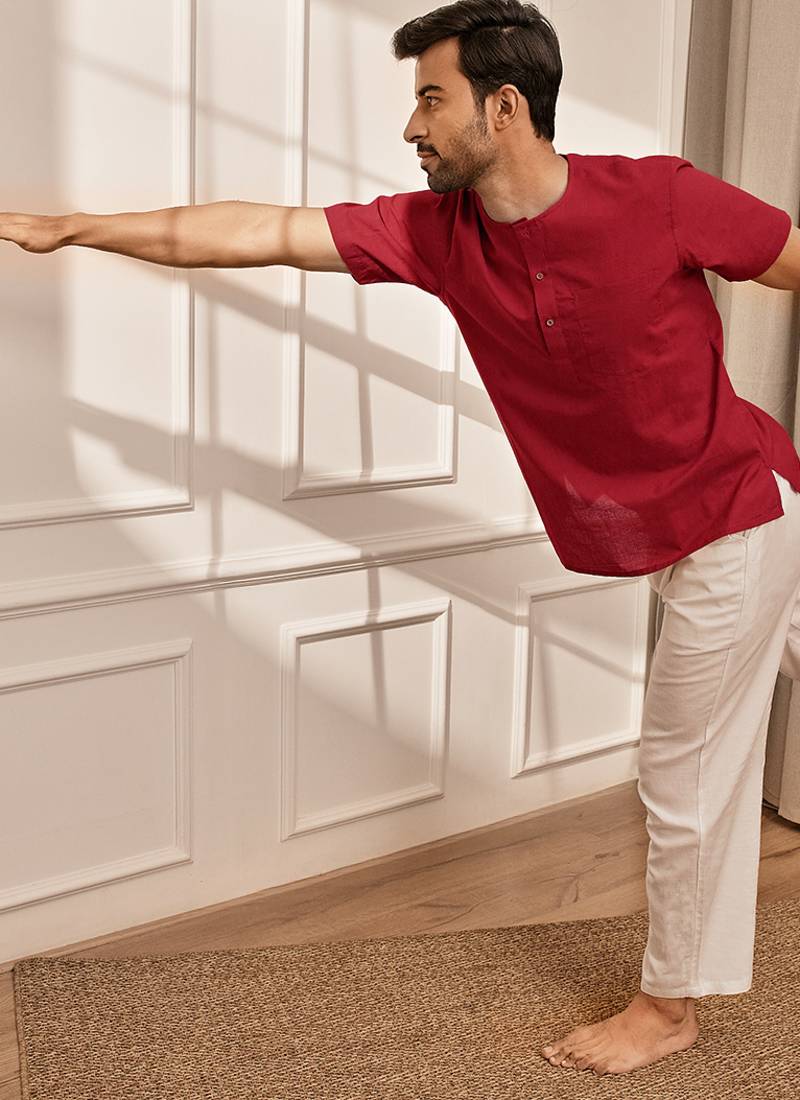 Red cotton kurta with om embroidery and white palazzo set