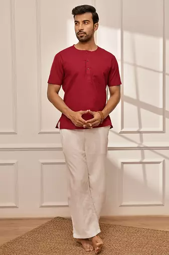 Red cotton kurta with om embroidery and white palazzo set