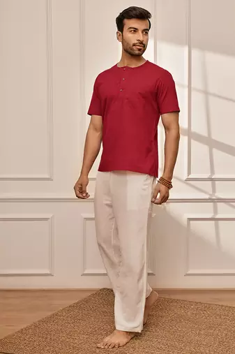 Red cotton kurta with om embroidery and white palazzo set