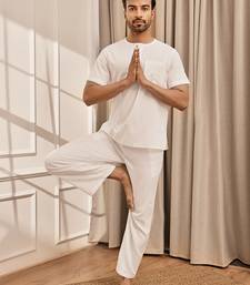 White cotton kurta with om embroidery and white palazzo set