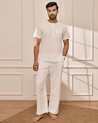 White cotton kurta with om embroidery and white palazzo set 3