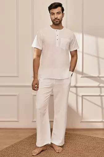 White cotton kurta with om embroidery and white palazzo set