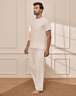 White cotton kurta with om embroidery and white palazzo set 4