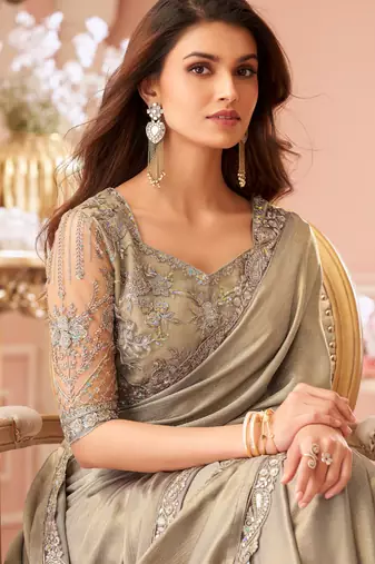 Beige chiffon embroidered bollywood-saree with bridal embroiderd blouse