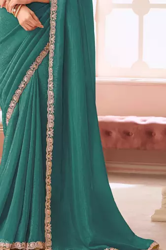 Teal chiffon embroidered bollywood-saree with bridal embroiderd blouse