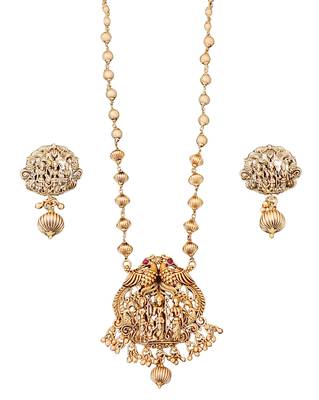 Antique gold plated temple necklace set featuring divine motifs and artistic craftsmanship perfect for festive occasions 3