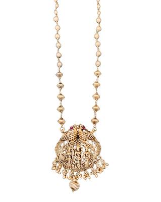 Antique gold plated temple necklace set featuring divine motifs and artistic craftsmanship perfect for festive occasions 4