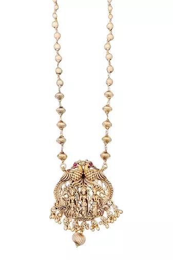 Antique gold plated temple necklace set featuring divine motifs and artistic craftsmanship perfect for festive occasions