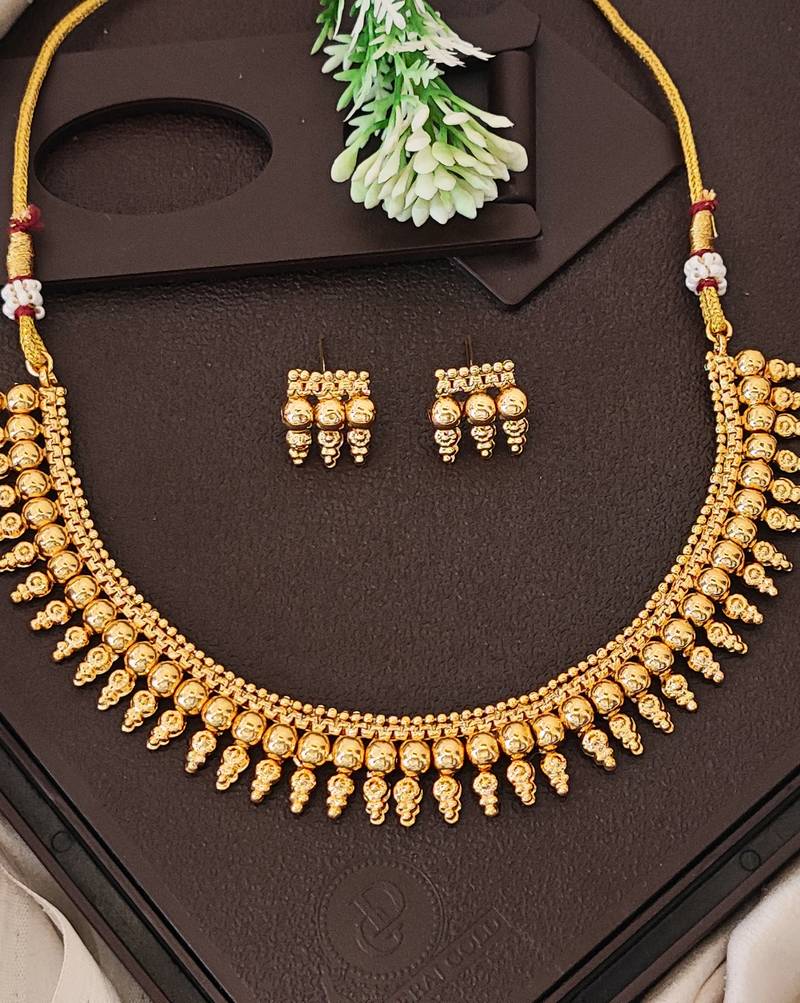 Traditional multi-layer gold plated coin necklace set with earrings | south indian temple jewelry design