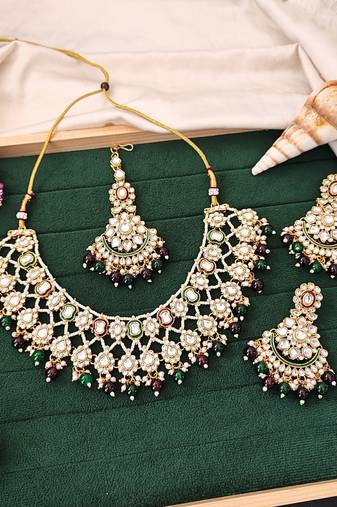 Kundan bridal necklace set with green and maroon beads | pearl embellished earrings & maang tikka for wedding wear