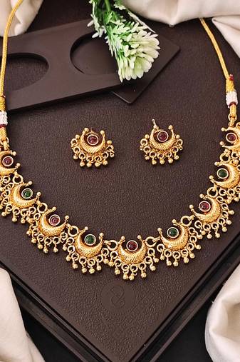 Gold plated necklace and earrings set with crescent motifs and multicolored stones – perfect for festive and ethnic wear