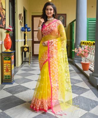 Yellow  muslin silk blend saree with pink border and woven motifs 1